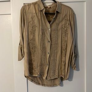 Gorgeous detailing on this cotton and jersey blouse.